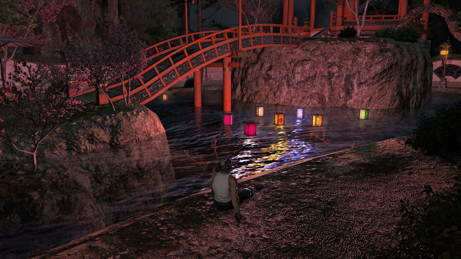 Erston sits by the water at night beneath a red bridge in the Doman Enclave, watching colorful lanterns drift across the surface. Cherry blossoms and warm light reflect on the river as he sits in silence, head bowed.